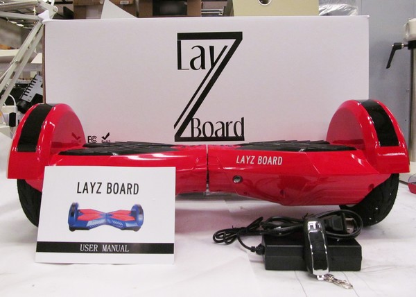 Red Layz Board hoverboard with user manual and charger