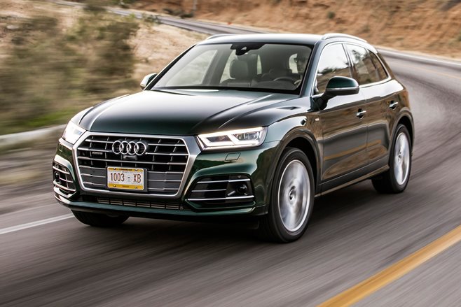 Audi Q5 SUV driving on a winding road