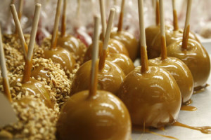 Delicious caramel apples on sticks ready to eat