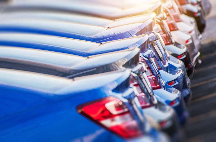 Row of cars showcasing sleek design and colors.