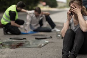 despair young female driver after traffic accident