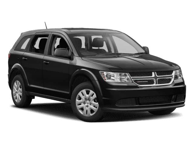 Black Dodge Journey SUV parked on a plain background