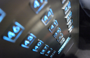 Close-up view of illuminated elevator buttons