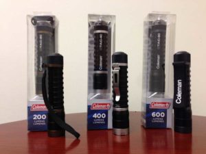 Various Coleman flashlights displayed in packaging